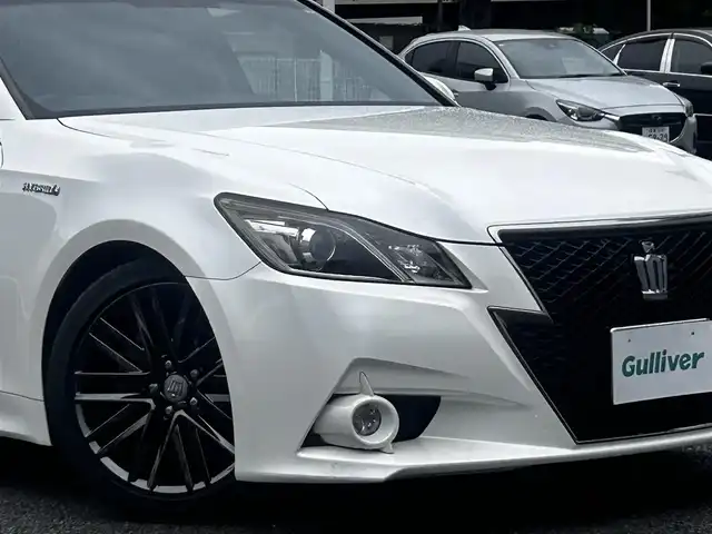 トヨタ クラウン ハイブリッド アスリートS 静岡県 2014(平26)年 6.9万km ホワイトパールクリスタルシャイン ユーザー買取車両/純正HDDナビ/【AM/FM/BT/TV/CD】/純正18インチAW/純正キセノンヘッドライト/エンジンスタートボタン/MTモード付AT/アイドリンクストップ/クルーズコントロール/スマートキー/スペアキー×１/バックカメラ/USB入力端子/レザーシート/パワーシート/横滑り防止装置/盗難防止装置/コーナーセンサー/保証書/取扱説明書