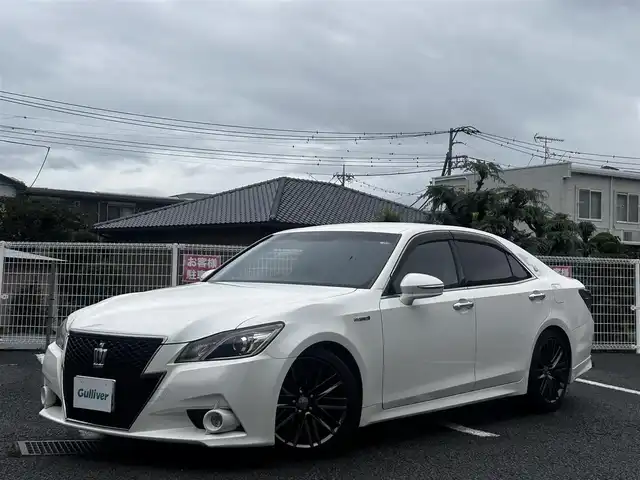 トヨタ クラウン ハイブリッド アスリートS 静岡県 2014(平26)年 6.9万km ホワイトパールクリスタルシャイン ユーザー買取車両/純正HDDナビ/【AM/FM/BT/TV/CD】/純正18インチAW/純正キセノンヘッドライト/エンジンスタートボタン/MTモード付AT/アイドリンクストップ/クルーズコントロール/スマートキー/スペアキー×１/バックカメラ/USB入力端子/レザーシート/パワーシート/横滑り防止装置/盗難防止装置/コーナーセンサー/保証書/取扱説明書