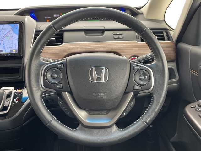 ホンダ フリード＋ ハイブリット クロスター ホンダセンシング 愛知県 2020(令2)年 4.5万km プレミアムクリスタルレッドM ホンダセンシング/9型ナビ/両側パワースライドドア/レーダークルーズコントロール/シートヒーター/バックカメラ/コーナーセンサー/純正アルミホイール/LEDヘッドライト/レーンキープアシスト/ETC/ステアリングスイッチ/Bluetooth/衝突軽減システム/CD DVD/スマートキー/プッシュスタート