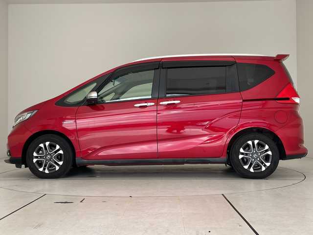 ホンダ フリード＋ ハイブリット クロスター ホンダセンシング 愛知県 2020(令2)年 4.5万km プレミアムクリスタルレッドM ホンダセンシング/9型ナビ/両側パワースライドドア/レーダークルーズコントロール/シートヒーター/バックカメラ/コーナーセンサー/純正アルミホイール/LEDヘッドライト/レーンキープアシスト/ETC/ステアリングスイッチ/Bluetooth/衝突軽減システム/CD DVD/スマートキー/プッシュスタート