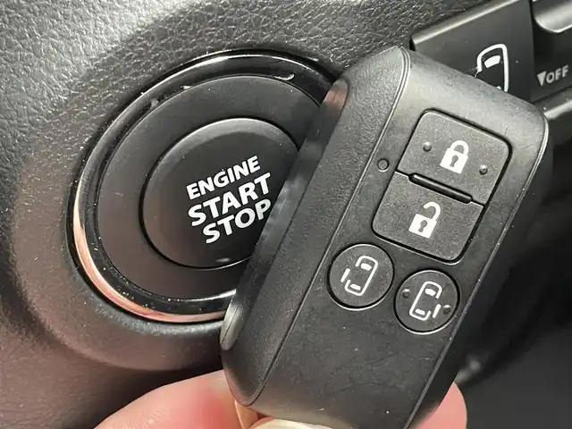 スズキ スペーシア カスタム HYBRID XS 千葉県 2024(令6)年 1.8万km ピュアホワイトP スズキセーフティサポート/・衝突軽減ブレーキ/レーンキープアシスト/・レーダークルーズコントロール/オートハイビーム/・クリアランスソナー/社外ナビ(AVIC-RZ114)/・BT/USB/バックカメラ/ETC/電動パーキングブレーキ/両側パワースライドドア/リアサーキュレーター/ハーフレザーシート/シートヒーター(D/N席)/ステアリングヒーター/LEDヘッドライト/オートライト/フォグライト/スマートキー/プッシュスタート/フロアマット/純正15インチAW