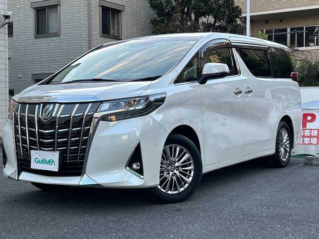 トヨタ アルファードハイブリット G Fパッケージ 埼玉県 2022(令4)年 0.9万km ホワイトパールクリスタルシャイン 登録時8573km/4WD/純正メモリナビ/　・フルセグ/BT/CD/DVD/Miracast/アラウンドビューモニター/レザーシート/前席パワーシート/前席エアシート/シートヒーター/両側パワースライドドア/衝突被害軽減ブレーキ/レーンキープアシスト/パーキングアシスト/レーダークルーズコントロール/コーナーセンサー/JBL/EV MODE/ECO MODE/ブレーキホールド/革巻きハンドル/ステアリングリモコン/ステアリングヒーター/ビルトインETC2.0/前後ドライブレコーダー/オットマン/オートライト/オートマチックハイビーム/プッシュスタート/スマートキー×2/ウィンカーミラー/LEDヘッドライト/フォグランプ/純正17インチアルミホイール/純正ドアバイザー/純正フロアマット/保証書/取扱説明書/ナビ取扱説明書