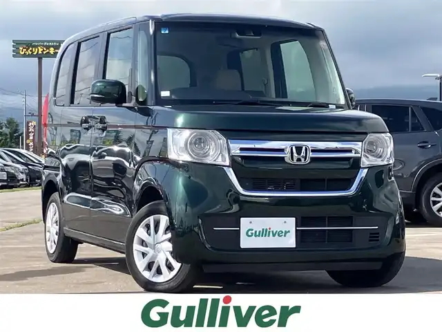 ホンダ Ｎ ＢＯＸ L 道南・函館 2021(令3)年 2.6万km ブリティッシュグリーンP ・衝突被害軽減ブレーキ/・レーダークルーズコントロール/・レーンキープアシスト/・純正ディスプレイオーディオ/・ワンセグTV/・バックカメラ/・片側パワースライドドア/・前席シートヒーター/・純正LEDヘッドライト/・オートライト/・スマートキー/・エンジンプッシュスタート