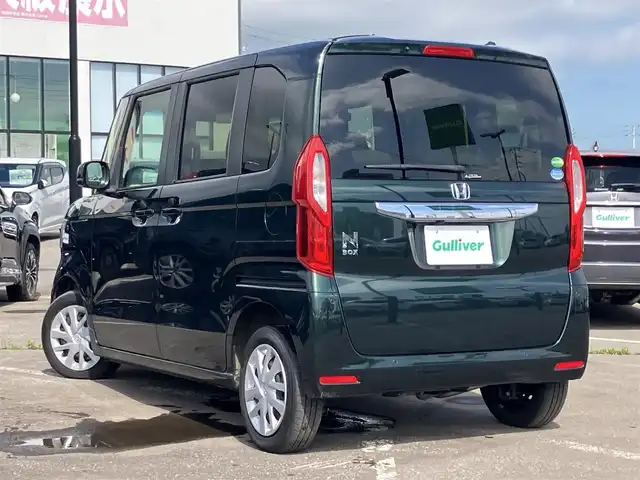 ホンダ Ｎ ＢＯＸ L 道南・函館 2021(令3)年 2.6万km ブリティッシュグリーンP ・衝突被害軽減ブレーキ/・レーダークルーズコントロール/・レーンキープアシスト/・純正ディスプレイオーディオ/・ワンセグTV/・バックカメラ/・片側パワースライドドア/・前席シートヒーター/・純正LEDヘッドライト/・オートライト/・スマートキー/・エンジンプッシュスタート