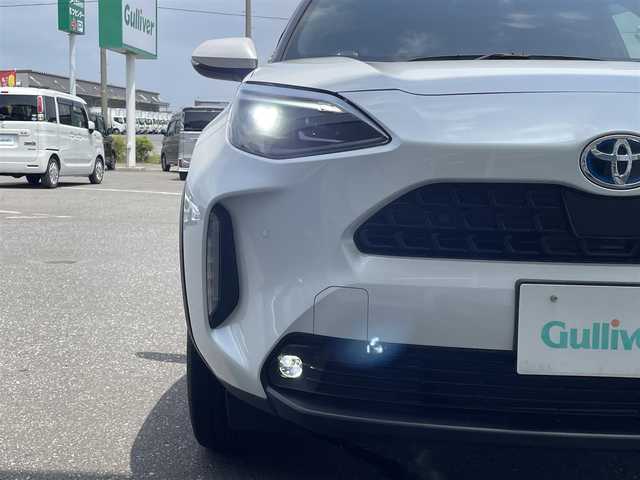 トヨタ ヤリスクロス ハイブリッド Z 青森県 2023(令5)年 3.4万km プラチナホワイトパールマイカ 純正ナビ/フルセグTV/BT/バックカメラ/トヨタセーフティセンス（LTA/PGS/BSM）/ETC/ステアリングヒーター/D席パワーシート/前席シートヒーター/アダプティブクルーズコントロール/TVキャンセラー/AC100V1500Wアクセサリー
