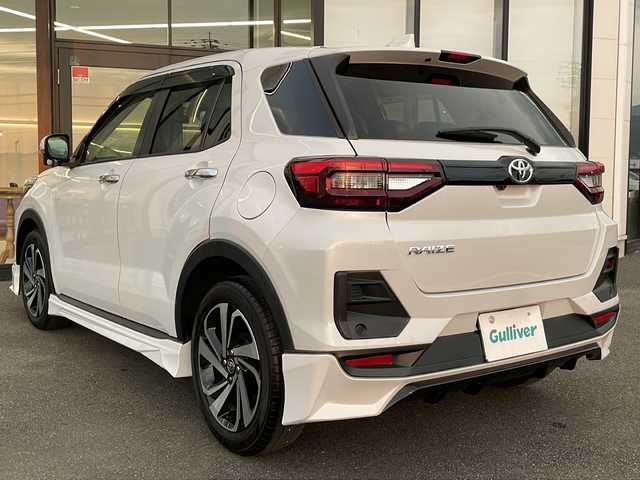 トヨタ ライズ Z 愛媛県 2023(令5)年 0.2万km シャイニングホワイトパール 社外9インチナビ/（フルセグTV/DVD/CD/BT）/全方位カメラ/スマートアシスト/・衝突被害軽減ブレーキ/・レーンキープアシスト/・レーダークルーズコントロール/・先行車発進お知らせ機能/BSM/TRDエアロ（F・S・R）/シートヒーター/ETC/ドライブレコーダー/LEDオートライト/フォグランプ/コーナーセンサー/革巻きステアリング/ステアリングスイッチ/純正17インチAW/純正フロアマット/スマートキー