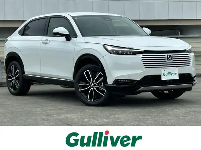 ホンダ ヴェゼル ハイブリッド e:HEV Z 静岡県 2025(令7)年 0.1千km プラチナホワイトパール ホンダセンシング/・衝突軽減ブレーキ/・レーンキープアシスト/・レーダークルーズコントロール/・前後コーナーセンサー/・ブラインドスポットモニター/Honda CONNECTディスプレー/Apple CarPlay/フルセグTV/ETC2.0車載器/電子制御オートブレーキホールド/Hondaスマートキーシステム/本革巻セレクトレバー/LEDオートヘッドライト/ワイヤレス充電器/USBチャージャー（Type-C）/シートヒーターD＋N/ハンドルヒーター/純正18AW/バックカメラ