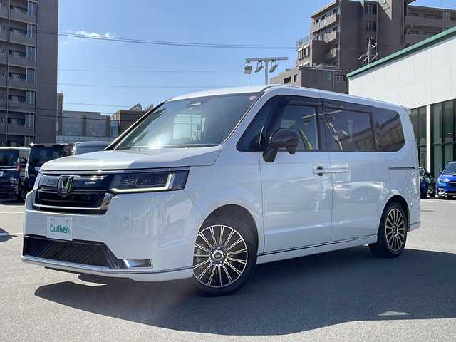 ホンダ ステップワゴン スパーダ 長野県 2023(令5)年 1.9万km プラチナホワイトパール ワンオーナー/禁煙車/純正11インチナビ LXM-237VFLi/バックカメラ/クルーズコントロール　追従走行あり/両側パワースライドドア/ハーフレザー/前席シートヒーター/アイドリングストップ/ドライブレコーダー/デジタルインナーミラー/コーナーセンサー/衝突被害軽減システム/レーンキープアシスト/横滑り防止装置/USB入力端子/ETC/AW　MUGEN/フロアマット MUGEN/フロントグリル　MUGEN/スマートキー
