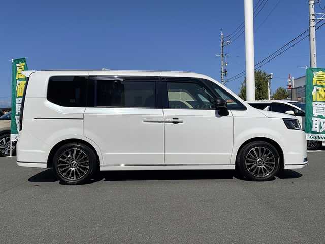 ホンダ ステップワゴン スパーダ 長野県 2023(令5)年 1.9万km プラチナホワイトパール ワンオーナー/禁煙車/純正11インチナビ LXM-237VFLi/バックカメラ/クルーズコントロール　追従走行あり/両側パワースライドドア/ハーフレザー/前席シートヒーター/アイドリングストップ/ドライブレコーダー/デジタルインナーミラー/コーナーセンサー/衝突被害軽減システム/レーンキープアシスト/横滑り防止装置/USB入力端子/ETC/AW　MUGEN/フロアマット MUGEN/フロントグリル　MUGEN/スマートキー