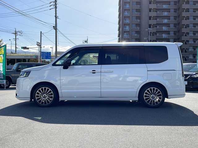 ホンダ ステップワゴン スパーダ 長野県 2023(令5)年 1.9万km プラチナホワイトパール ワンオーナー/禁煙車/純正11インチナビ LXM-237VFLi/バックカメラ/クルーズコントロール　追従走行あり/両側パワースライドドア/ハーフレザー/前席シートヒーター/アイドリングストップ/ドライブレコーダー/デジタルインナーミラー/コーナーセンサー/衝突被害軽減システム/レーンキープアシスト/横滑り防止装置/USB入力端子/ETC/AW　MUGEN/フロアマット MUGEN/フロントグリル　MUGEN/スマートキー