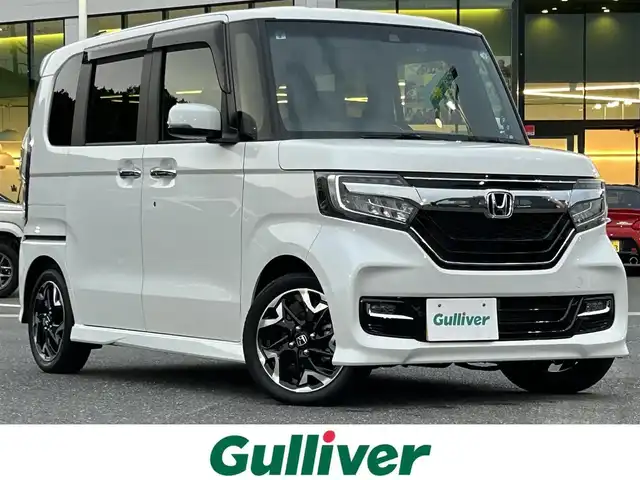 ホンダ Ｎ ＢＯＸ カスタム G L ターボ ホンダセンシング 島根県 2019(令1)年 1.5万km プラチナホワイトパール 登録時走行距離14436km/Gathersナビ(Bluetooth・AM・FM・CD・DVD)/フルセグTV/バックカメラ/ホンダセンシング/・衝突被害軽減ブレーキ/・誤発進抑制機能/・後方誤発進抑制機能/・歩行者事故低減ステアリング/・車線維持支援システム/・アダプティブクルーズコントロール/・先行車発進お知らせ機能/コーナーセンサー/ドライブレコーダー/ETC/プラズマクラスター技術搭載フルオートエアコン/両側パワースライドドア/前席エアバッグ/サイドカーテンエアバッグ/アレルクリーンシート/ブラック塗装純正15インチAW/パドルシフト/LEDヘッドライト/オートハイビーム/フォグランプ/禁煙車