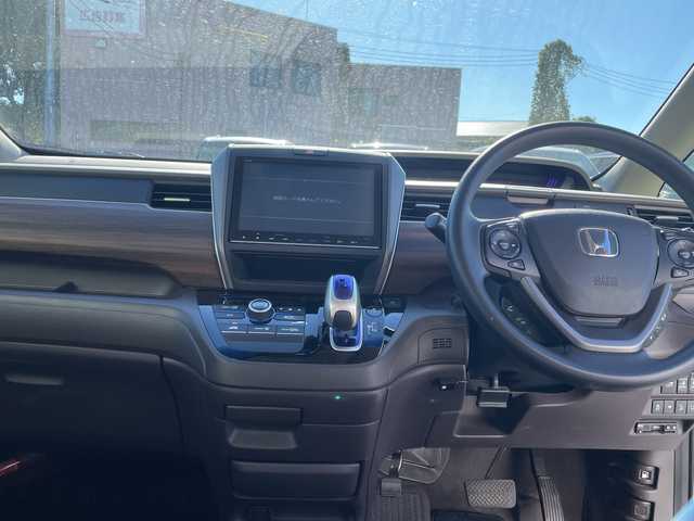 ホンダ フリード ハイブリット G ホンダセンシング 千葉県 2017(平29)年 5.7万km ホワイトオーキッドパール モデューロエアロ　モデューロアルミ　９型ナビＶＸＭ－１７５ＶＦＮｉ　フリップダウンモニター　バックカメラ　両側電動スライドドア　ＢＴ　ドラレコ　ETC　レーダークルーズ　LEDライト　オートライト