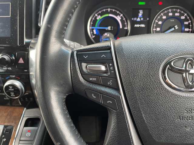 トヨタ ヴェルファイア ハイブリット エグゼクティブ ラウンジ 秋田県 2016(平28)年 4.7万km バーニングブラッククリスタルシャインガラスフレーク ・４WD/・寒冷地仕様/・純正ナビ/・フルセグTV/・Bluetooth/・後席モニター/・全周囲カメラ/・ムーンルーフ/・両側パワースライドドア/・クルーズコントロール/・ステアリングヒーター/・シートヒーター/・レザーシート/・パワーシート/・スペアキー/・衝突軽減システム/・ドラレコ/・冬タイヤ積込み