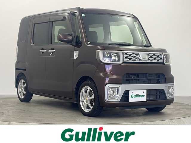 ダイハツ ウェイク G SA 大阪府 2015(平27)年 6.8万km プラムブラウンクリスタルマイカ 純正８インチナビ　/（フルセグ／ＢＴ／ＣＤ／ＤＶＤ）　/バックモニター　/衝突軽減システム　/両側パワースライドドア　/後席サンシェード　/オートライト　/ＬＥＤヘッドライト　/ＥＴＣ　/社外ＡＷ　/スマートキー