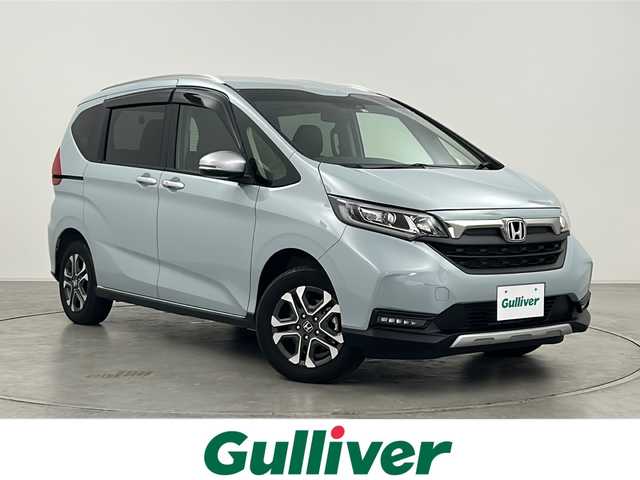 ホンダ フリード ハイブリット クロスター 群馬県 2022(令4)年 1.2万km フィヨルドミストパール 純正９型ナビ　バックカメラ　前後ドラレコ　ＥＴＣ　ハーフレザーシート　シートヒーター　両側電動スライドドア　アダプティブクルーズコントロール　衝突被害軽減ブレーキ　ルーフレール　ＬＥＤライト　禁煙車
