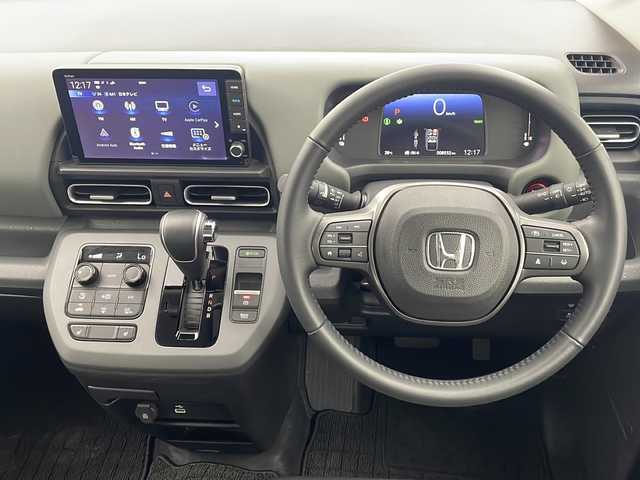 ホンダ フリード ハイブリット e:HEV クロスター 栃木県 2024(令6)年 0.9万km フレスコブルーパール 純正ナビ/（フルセグTV/BT/FM・AM/Apple carplay)/バックカメラ/ホンダセンシング/・衝突被害軽減システム/・レーンキープアシスト/・誤発進抑制装置/・クルーズコントロール/・ブラインドストップモニター/ドライブレコーダー/横滑り防止装置/両側パワースライドドア/電動格納ミラー/前席シートヒーター/ステアリングリモコン/革巻きステアリング/純正１５インチAW/ドアバイザー