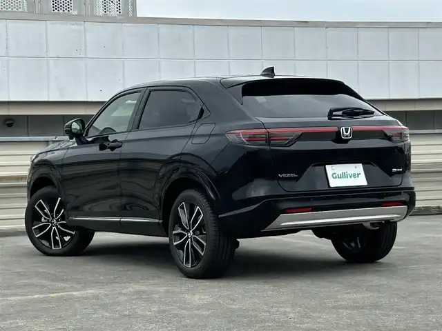 ホンダ ヴェゼル ハイブリッド e:HEV Z 静岡県 2025(令7)年 0.1千km クリスタルブラックパール ホンダセンシング/・衝突軽減ブレーキ/・レーンキープアシスト/・レーダークルーズコントロール/・前後コーナーセンサー/・ブラインドスポットモニター/Honda CONNECTディスプレー/Apple CarPlay/フルセグTV/ETC2.0車載器/電子制御オートブレーキホールド/Hondaスマートキーシステム/本革巻セレクトレバー/LEDオートヘッドライト/ワイヤレス充電器/USBチャージャー（Type-C）/シートヒーターD＋N/ハンドルヒーター/純正18AW/バックカメラ