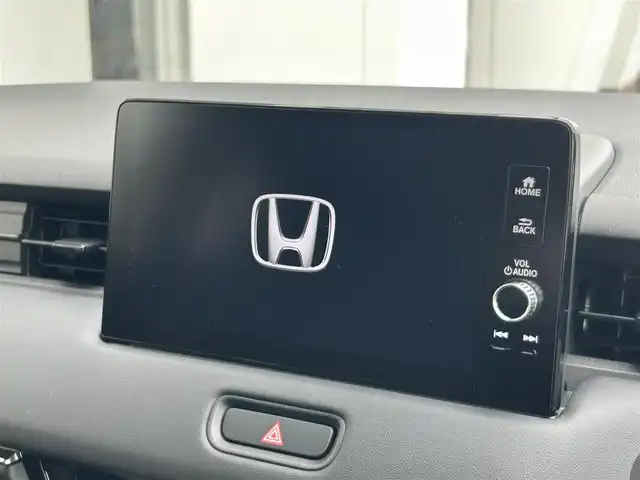 ホンダ ヴェゼル ハイブリッド e:HEV Z 静岡県 2025(令7)年 0.1千km クリスタルブラックパール ホンダセンシング/・衝突軽減ブレーキ/・レーンキープアシスト/・レーダークルーズコントロール/・前後コーナーセンサー/・ブラインドスポットモニター/Honda CONNECTディスプレー/Apple CarPlay/フルセグTV/ETC2.0車載器/電子制御オートブレーキホールド/Hondaスマートキーシステム/本革巻セレクトレバー/LEDオートヘッドライト/ワイヤレス充電器/USBチャージャー（Type-C）/シートヒーターD＋N/ハンドルヒーター/純正18AW/バックカメラ