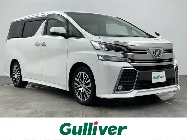 トヨタ ヴェルファイア Z Gエディション 大分県 2017(平29)年 4.7万km ホワイトパールクリスタルシャイン 純正ナビ/（フルセグ/CD/DVD/Bluetooth）/衝突軽減ブレーキ/レーダークルーズコントロール/オートハイビーム/前方ドライブレコーダー/ビルトインETC2.0/バックカメラ/ハーフレザーシート/前席パワーシート/（運転席ポジションメモリー）/バックカメラ/ステアリングスイッチ/電動パーキングブレーキ/オートブレーキホールド/オートリトラミラー/保証書・取扱説明書