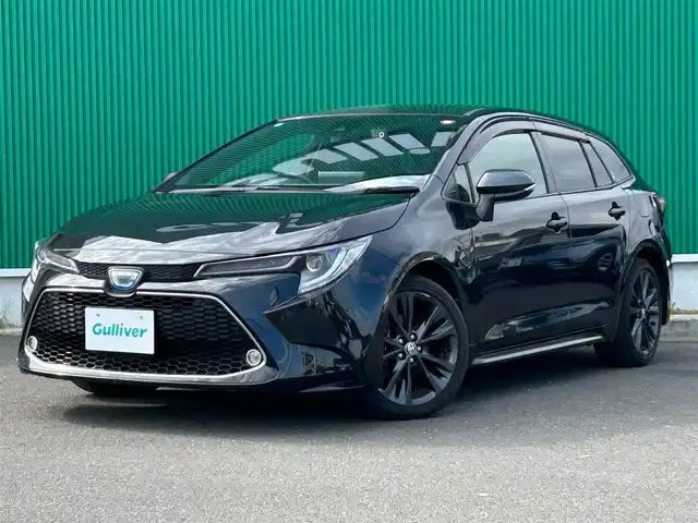 トヨタ カローラツーリング ハイブリッド ダブルバイビー 宮城県 2020(令2)年 7.8万km ブラックマイカ 寒冷地仕様/シートヒーター/ステアリングヒーター/アクセサリーコンセント（AC100V/1500W）/ブラインドスポットモニターセット/・ブラインドスポットモニター/・リアクロストラフィックオートブレーキ/9インチディスプレイオーディオ/・ナビ機能/・フルセグTV/・Bluetooth/＝＝＝/セーフティセンス/・プリクラッシュセーフティ/・レーントレーシングアシスト/・全車速追従機能付レーダークルーズコントロール/・オートマチックハイビーム/・ロードサインアシスト/インテリジェントクリアランスソナー/バックカメラ/ビルトインETC2.0/ドライブレコーダー/充電用USB端子/ハーフレザーシート/革巻きステアリング/ステアリングスイッチ/電動パーキングブレーキ/ブレーキホールド/LEDヘッドランプ/フォグランプ/オートライト/スマートキー＆プッシュスタート/スペアキー/電動格納ミラー/純正17インチAW/純正フロアマット/純正ドアバイザー/W/サイド/カーテンエアバッグ