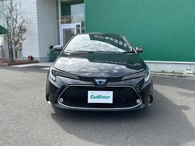 トヨタ カローラツーリング ハイブリッド ダブルバイビー 宮城県 2020(令2)年 7.8万km ブラックマイカ 寒冷地仕様/シートヒーター/ステアリングヒーター/アクセサリーコンセント（AC100V/1500W）/ブラインドスポットモニターセット/・ブラインドスポットモニター/・リアクロストラフィックオートブレーキ/9インチディスプレイオーディオ/・ナビ機能/・フルセグTV/・Bluetooth/＝＝＝/セーフティセンス/・プリクラッシュセーフティ/・レーントレーシングアシスト/・全車速追従機能付レーダークルーズコントロール/・オートマチックハイビーム/・ロードサインアシスト/インテリジェントクリアランスソナー/バックカメラ/ビルトインETC2.0/ドライブレコーダー/充電用USB端子/ハーフレザーシート/革巻きステアリング/ステアリングスイッチ/電動パーキングブレーキ/ブレーキホールド/LEDヘッドランプ/フォグランプ/オートライト/スマートキー＆プッシュスタート/スペアキー/電動格納ミラー/純正17インチAW/純正フロアマット/純正ドアバイザー/W/サイド/カーテンエアバッグ