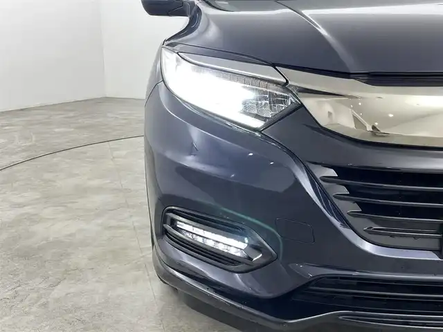 ホンダ ヴェゼル ハイブリッド Z ホンダセンシング 福島県 2018(平30)年 3.3万km ミッドナイトブルービームM ホンダセンシング/・衝突軽減ブレーキ /・誤発進抑制機能 /・歩行者事故低減ステアリング /・路外逸脱抑制機能 /・アダプティブ・クルーズ・コントロール/・車線維持支援システム/・先行車発進お知らせ機能 /・標識認識機能/純正ナビゲーション/・型式：VXM-197VFEi/・Bluetooth/TV/CD/DVD/AM・FM/・バックカメラ/・ETC/プッシュスタート/・スマートキー/・電子パーキング/・オートホールド/LEDライト/・オートライト/・フォグライト/革巻きステアリング/・ステアリングスイッチ/・パドルシフト/電動格納ウィンカーミラー/純正フロアマット/ドアバイザー