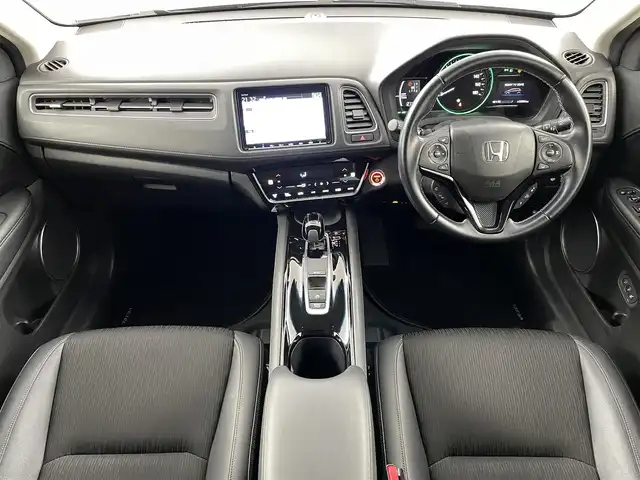ホンダ ヴェゼル ハイブリッド Z ホンダセンシング 福島県 2018(平30)年 3.3万km ミッドナイトブルービームM ホンダセンシング/・衝突軽減ブレーキ /・誤発進抑制機能 /・歩行者事故低減ステアリング /・路外逸脱抑制機能 /・アダプティブ・クルーズ・コントロール/・車線維持支援システム/・先行車発進お知らせ機能 /・標識認識機能/純正ナビゲーション/・型式：VXM-197VFEi/・Bluetooth/TV/CD/DVD/AM・FM/・バックカメラ/・ETC/プッシュスタート/・スマートキー/・電子パーキング/・オートホールド/LEDライト/・オートライト/・フォグライト/革巻きステアリング/・ステアリングスイッチ/・パドルシフト/電動格納ウィンカーミラー/純正フロアマット/ドアバイザー