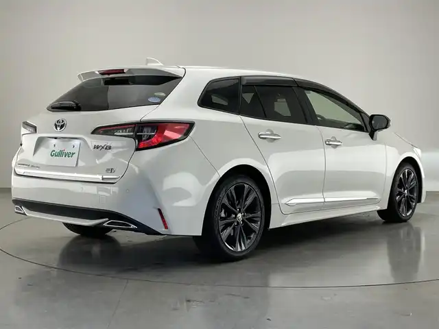 トヨタ カローラツーリング ハイブリッド ダブルバイビー 愛知県 2020(令2)年 5.8万km ホワイトパールクリスタルシャイン 純正９型ＤＡナビフルセグＴＶ　シートヒーター　ＤＶＤデッキ　革調シートカバー　モデリスタガーニッシュ多数　電動パーキング　ＨＵＤ　前後ドラレコ　セーフティセンス　衝突軽減　追従クルコン　ＬＥＤライト　禁煙車　純正フロアマット　ドアバイザー　コーナーセンサー　ステアリングヒーター　トノカバー