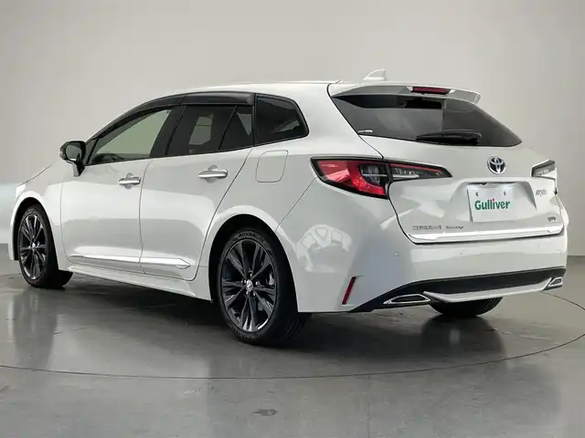 トヨタ カローラツーリング ハイブリッド ダブルバイビー 愛知県 2020(令2)年 5.8万km ホワイトパールクリスタルシャイン 純正９型ＤＡナビフルセグＴＶ　シートヒーター　ＤＶＤデッキ　革調シートカバー　モデリスタガーニッシュ多数　電動パーキング　ＨＵＤ　前後ドラレコ　セーフティセンス　衝突軽減　追従クルコン　ＬＥＤライト　禁煙車　純正フロアマット　ドアバイザー　コーナーセンサー　ステアリングヒーター　トノカバー