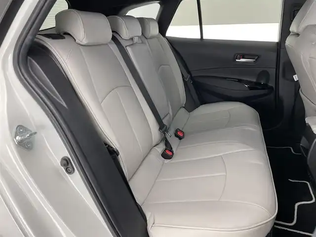 トヨタ カローラツーリング ハイブリッド ダブルバイビー 愛知県 2020(令2)年 5.8万km ホワイトパールクリスタルシャイン 純正９型ＤＡナビフルセグＴＶ　シートヒーター　ＤＶＤデッキ　革調シートカバー　モデリスタガーニッシュ多数　電動パーキング　ＨＵＤ　前後ドラレコ　セーフティセンス　衝突軽減　追従クルコン　ＬＥＤライト　禁煙車　純正フロアマット　ドアバイザー　コーナーセンサー　ステアリングヒーター　トノカバー