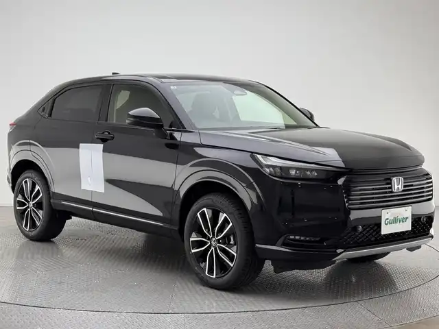 ホンダ ヴェゼル ハイブリッド e:HEV Z 兵庫県 2025(令7)年 0.1万km未満 クリスタルブラックパール ホンダコネクトナビ/(apple carplay/androidauto/フルセグ/Bluetooth)/バックカメラ/追従型クルーズコントロール/前後コーナーセンサー/レーンキープアシスト/パワーバックドア/オートライト/ハーフレザーシート/シートヒーター(D+N席)/ステアリングヒーター/パドルシフト/ダウンヒルアシストコントロール/LEDヘッドライト/オートライト/電子パーキング/ブレーキホールド/ワイヤレス充電/純正18インチアルミホイール/スマートキー/スペアキー/ビルトインETC2.0