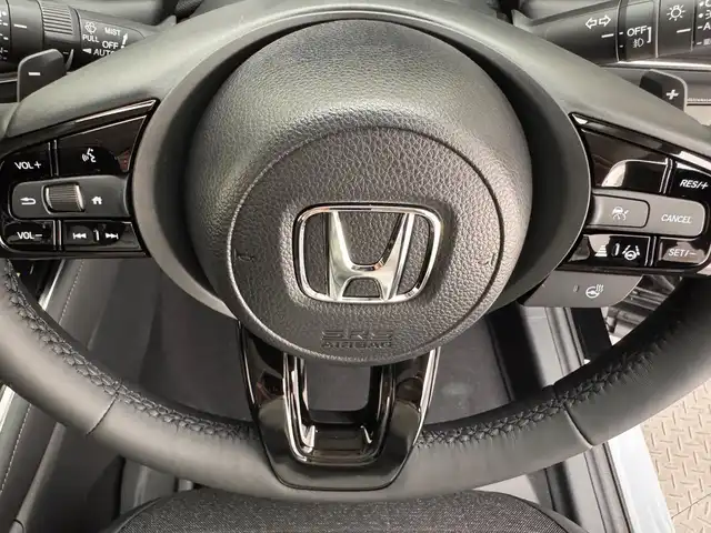 ホンダ ヴェゼル ハイブリッド e:HEV Z 兵庫県 2025(令7)年 0.1万km未満 クリスタルブラックパール ホンダコネクトナビ/(apple carplay/androidauto/フルセグ/Bluetooth)/バックカメラ/追従型クルーズコントロール/前後コーナーセンサー/レーンキープアシスト/パワーバックドア/オートライト/ハーフレザーシート/シートヒーター(D+N席)/ステアリングヒーター/パドルシフト/ダウンヒルアシストコントロール/LEDヘッドライト/オートライト/電子パーキング/ブレーキホールド/ワイヤレス充電/純正18インチアルミホイール/スマートキー/スペアキー/ビルトインETC2.0