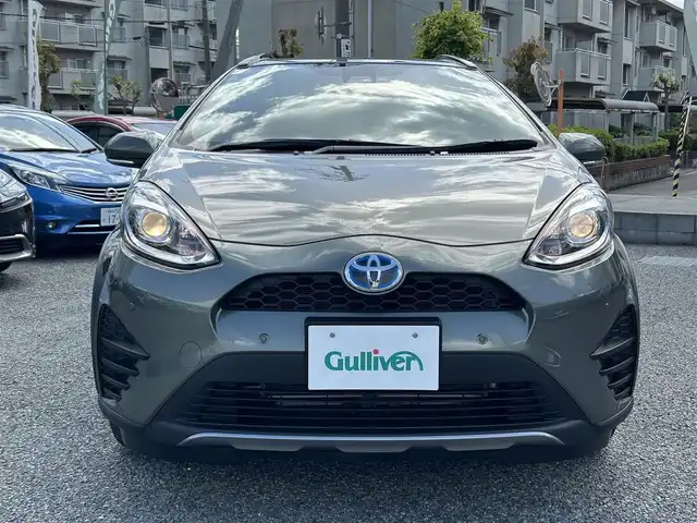 トヨタ アクア クロスオーバー グラム 兵庫県 2019(令1)年 3.9万km オリーブマイカM ・ワンオーナー/・純正メモリーナビ/・TV/BT/AUX/・バックカメラ/・ステアリングリモコン/・ハーフレザーシート/・ビルトインETC/・純正16インチAW/・プリクラッシュセーフティ/・レーンディーパーチャーアラート/・オートマチックハイビーム/・パーキングサポートブレーキ/・クリアランスソナー/・先行車発進お知らせ/・スマートキー/・ドライブレコーダー前/・R2/3/4/6年ディーラー記録簿