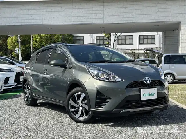 トヨタ アクア クロスオーバー グラム 兵庫県 2019(令1)年 3.9万km オリーブマイカM ・ワンオーナー/・純正メモリーナビ/・TV/BT/AUX/・バックカメラ/・ステアリングリモコン/・ハーフレザーシート/・ビルトインETC/・純正16インチAW/・プリクラッシュセーフティ/・レーンディーパーチャーアラート/・オートマチックハイビーム/・パーキングサポートブレーキ/・クリアランスソナー/・先行車発進お知らせ/・スマートキー/・ドライブレコーダー前/・R2/3/4/6年ディーラー記録簿
