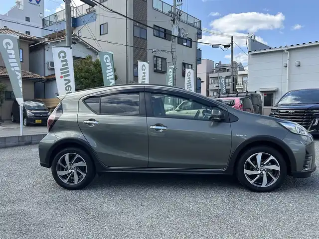 トヨタ アクア クロスオーバー グラム 兵庫県 2019(令1)年 3.9万km オリーブマイカM ・ワンオーナー/・純正メモリーナビ/・TV/BT/AUX/・バックカメラ/・ステアリングリモコン/・ハーフレザーシート/・ビルトインETC/・純正16インチAW/・プリクラッシュセーフティ/・レーンディーパーチャーアラート/・オートマチックハイビーム/・パーキングサポートブレーキ/・クリアランスソナー/・先行車発進お知らせ/・スマートキー/・ドライブレコーダー前/・R2/3/4/6年ディーラー記録簿