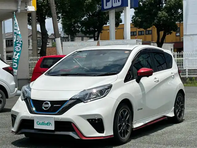 日産 ノート e－パワー ニスモ 熊本県 2017(平29)年 7.1万km ブリリアントホワイトパール ワンオーナー/衝突軽減ブレーキ/レーンキープアシスト/プッシュスタート/純正ナビ/（CD・DVD・フルセグTV・BTオーディオ・SD）/アラウンドビューモニター/ETC/純正16インチAW/LEDヘッドライト/オートライト/前後コーナーセンサー/横滑り防止装置/ウィンカーミラー/純正フロアマット/純正ドアバイザー/新車保証書/取扱説明書/スマートスペアキー×1本