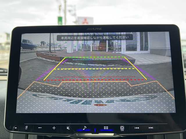 スズキ ジムニー シエラ JC 秋田県 2023(令5)年 4.2万km ミディアムグレー 社外ディスプレイオーディオ/社外BT/バックカメラ/社外15インチAW/背面タイヤ積み込み/４WD/ETC/前後ドライブレコーダー