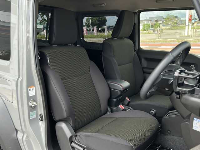 スズキ ジムニー シエラ JC 秋田県 2023(令5)年 4.2万km ミディアムグレー 社外ディスプレイオーディオ/社外BT/バックカメラ/社外15インチAW/背面タイヤ積み込み/４WD/ETC/前後ドライブレコーダー