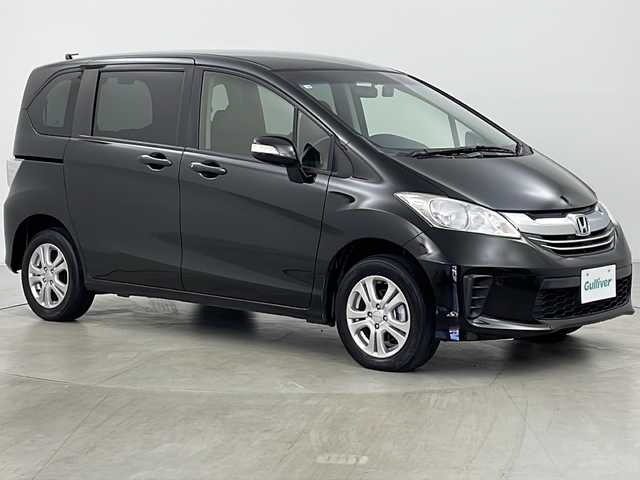 ホンダ フリード G ジャストセレクション 道央・札幌 2014(平26)年 8万km プレミアムスパークルブラックパール ・４WD/・純正SDナビ(CD&DVD&BT&ワンセグTV&SD)/・寒冷地仕様/・横滑り防止/・ステアリングスイッチ/・社外ドラレコ(前後)/・純正フロアマット/・シートアジャスター/・片側パワースライドドア/・フロントワイパーデアイサー/・ミラーヒーター/・リトラミラー/・社外エンジンスターター/・HIDライト/・キーレスキー/・スマートキー