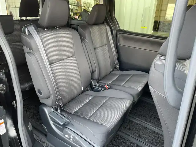 トヨタ ヴォクシー ZS 煌 東京都 2018(平30)年 1.8万km ブラック 純正９型ナビ　/・Ｂｌｕｅｔｏｏｔｈ　/・フルセグ　/・ＣＤ／ＤＶＤ再生　/純正１２型フリップダウンモニター　/ＴＳＳ　/・クルーズコントロール　/・衝突軽減/・LKAS　/両側電動スライドドア　/バックモニター　/ＡＨＢ　/ＬＥＤヘッド