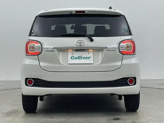 トヨタ パッソ モーダ　Gパッケージ 岡山県 2016(平28)年 5.4万km パールホワイトⅢ 純正7インチナビ NSZT-W66T/地デジフルセグTV/Bluetooth/CD/DVD/SD/バックカメラ /スマートアシスト/シートヒーター/レザー調シートカバー/モデリスタ14インチアルミホイール/ビルトインETC/LEDヘッドライト/フォグランプ/オートライト /アイドリングストップ/社外フロアマット/ステアリングスイッチ/前後ドライブレコーダー
