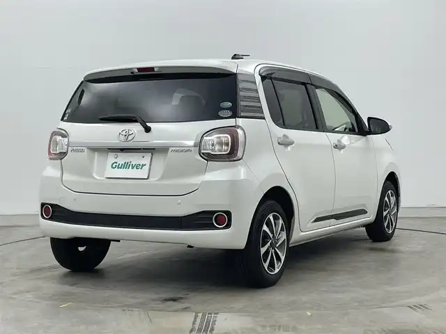 トヨタ パッソ モーダ　Gパッケージ 岡山県 2016(平28)年 5.4万km パールホワイトⅢ 純正7インチナビ NSZT-W66T/地デジフルセグTV/Bluetooth/CD/DVD/SD/バックカメラ /スマートアシスト/シートヒーター/レザー調シートカバー/モデリスタ14インチアルミホイール/ビルトインETC/LEDヘッドライト/フォグランプ/オートライト /アイドリングストップ/社外フロアマット/ステアリングスイッチ/前後ドライブレコーダー