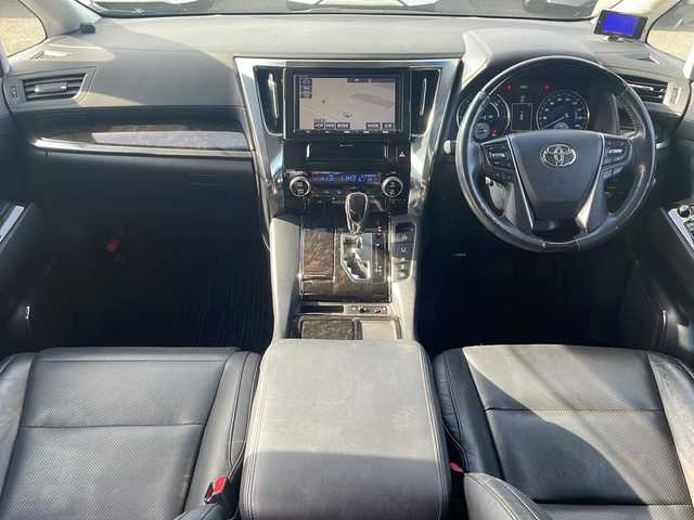 トヨタ アルファードハイブリット SR Cパッケージ 道東・釧路十勝 2015(平27)年 10.8万km ホワイトパールクリスタルシャイン ・サンルーフ/・4WD/・純正9インチSDナビ/(BT フルセグ CD DVD FM AM)/・バックカメラ/・純正11インチフリップダウンモニター/・レーダークルーズコントロール/・両側パワースライドドア/・電動リアゲート/・AC１００V（１５００W）/・前席・2ndパワーシート/・革シート/・電動オットマン/・前席シートヒーター/・ETC2.0/・衝突軽減システム/・横滑り防止/・コーナーセンサー/・前方ドライブレコーダー/・LEDヘッドライト/・フォグライト/・オートマチックハイビーム/・オートライト/・ドアバイザー/・電格ミラー