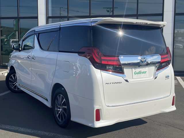 トヨタ アルファードハイブリット SR Cパッケージ 道東・釧路十勝 2015(平27)年 10.8万km ホワイトパールクリスタルシャイン ・サンルーフ/・4WD/・純正9インチSDナビ/(BT フルセグ CD DVD FM AM)/・バックカメラ/・純正11インチフリップダウンモニター/・レーダークルーズコントロール/・両側パワースライドドア/・電動リアゲート/・AC１００V（１５００W）/・前席・2ndパワーシート/・革シート/・電動オットマン/・前席シートヒーター/・ETC2.0/・衝突軽減システム/・横滑り防止/・コーナーセンサー/・前方ドライブレコーダー/・LEDヘッドライト/・フォグライト/・オートマチックハイビーム/・オートライト/・ドアバイザー/・電格ミラー