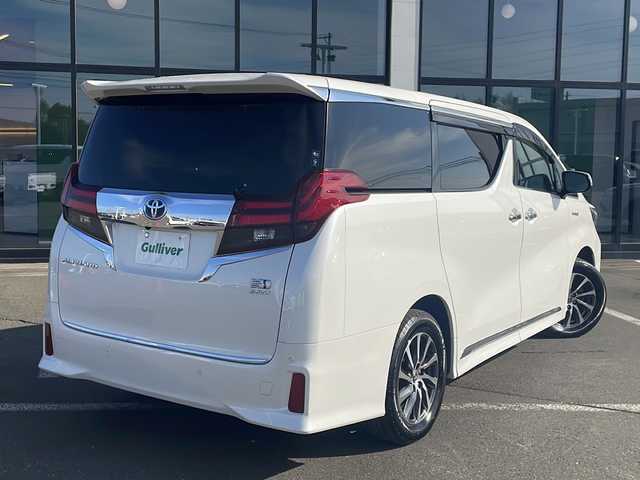 トヨタ アルファードハイブリット SR Cパッケージ 道東・釧路十勝 2015(平27)年 10.8万km ホワイトパールクリスタルシャイン ・サンルーフ/・4WD/・純正9インチSDナビ/(BT フルセグ CD DVD FM AM)/・バックカメラ/・純正11インチフリップダウンモニター/・レーダークルーズコントロール/・両側パワースライドドア/・電動リアゲート/・AC１００V（１５００W）/・前席・2ndパワーシート/・革シート/・電動オットマン/・前席シートヒーター/・ETC2.0/・衝突軽減システム/・横滑り防止/・コーナーセンサー/・前方ドライブレコーダー/・LEDヘッドライト/・フォグライト/・オートマチックハイビーム/・オートライト/・ドアバイザー/・電格ミラー