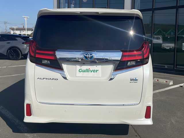 トヨタ アルファードハイブリット SR Cパッケージ 道東・釧路十勝 2015(平27)年 10.8万km ホワイトパールクリスタルシャイン ・サンルーフ/・4WD/・純正9インチSDナビ/(BT フルセグ CD DVD FM AM)/・バックカメラ/・純正11インチフリップダウンモニター/・レーダークルーズコントロール/・両側パワースライドドア/・電動リアゲート/・AC１００V（１５００W）/・前席・2ndパワーシート/・革シート/・電動オットマン/・前席シートヒーター/・ETC2.0/・衝突軽減システム/・横滑り防止/・コーナーセンサー/・前方ドライブレコーダー/・LEDヘッドライト/・フォグライト/・オートマチックハイビーム/・オートライト/・ドアバイザー/・電格ミラー