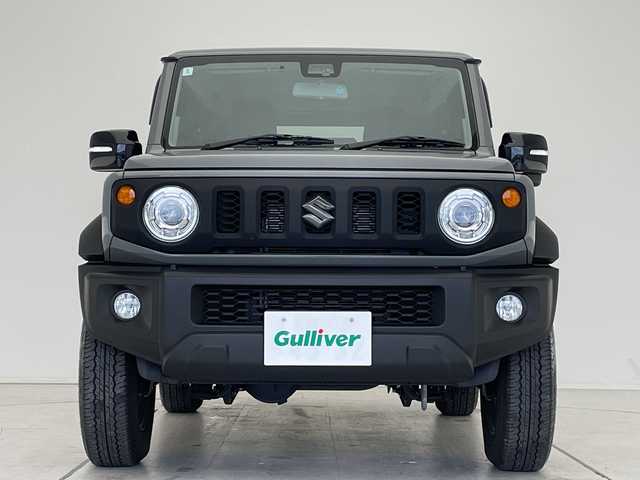 スズキ ジムニー シエラ JC 愛知県 2024(令6)年 2.2万km ミディアムグレー ディスプレイオーディオ　ナビ機能なし/クルーズコントロール/シートヒーター/バックカメラ/Bluetooth/衝突軽減システム/純正アルミホイール/４WD/LEDヘッドライト/レーンキープアシスト/ステアリングスイッチ/スマートキー/プッシュスタート