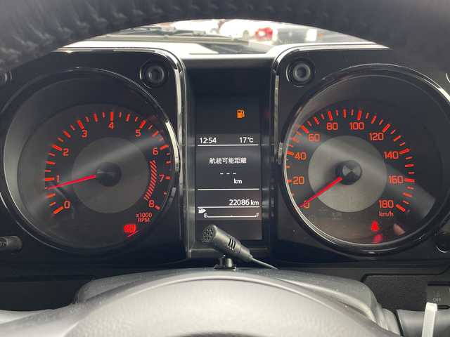 スズキ ジムニー シエラ JC 愛知県 2024(令6)年 2.2万km ミディアムグレー ディスプレイオーディオ　ナビ機能なし/クルーズコントロール/シートヒーター/バックカメラ/Bluetooth/衝突軽減システム/純正アルミホイール/４WD/LEDヘッドライト/レーンキープアシスト/ステアリングスイッチ/スマートキー/プッシュスタート