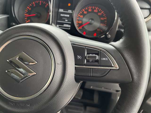 スズキ ジムニー シエラ JC 愛知県 2024(令6)年 2.2万km ミディアムグレー ディスプレイオーディオ　ナビ機能なし/クルーズコントロール/シートヒーター/バックカメラ/Bluetooth/衝突軽減システム/純正アルミホイール/４WD/LEDヘッドライト/レーンキープアシスト/ステアリングスイッチ/スマートキー/プッシュスタート