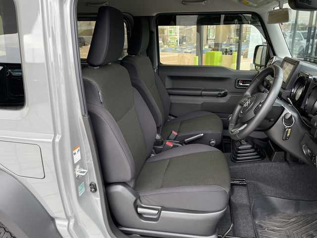 スズキ ジムニー シエラ JC 愛知県 2024(令6)年 2.2万km ミディアムグレー ディスプレイオーディオ　ナビ機能なし/クルーズコントロール/シートヒーター/バックカメラ/Bluetooth/衝突軽減システム/純正アルミホイール/４WD/LEDヘッドライト/レーンキープアシスト/ステアリングスイッチ/スマートキー/プッシュスタート